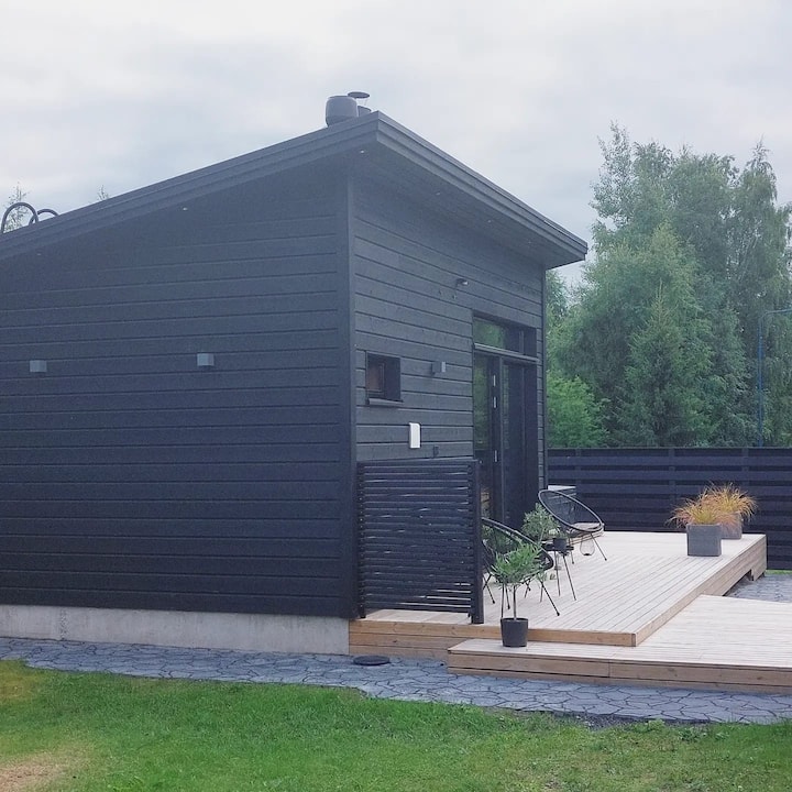 Backyard wooden sauna with all condiments