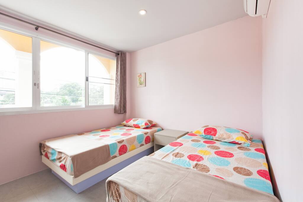 Twin Bed with City View