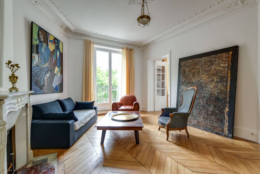 The stylish living room with balcony access