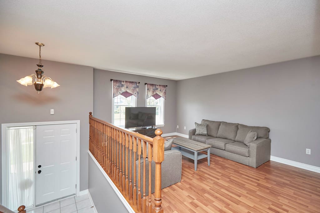 An overview of the living room and front door