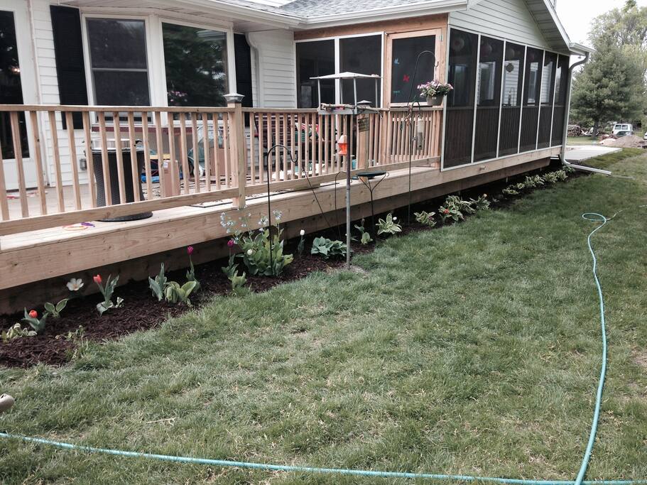 Southeastern deck area sits outside the front entry to the In-Law Suite