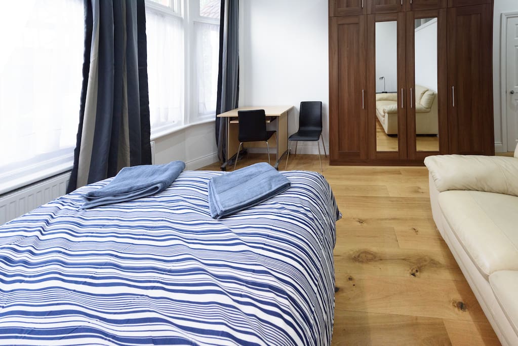 Bedroom: showing bed, writing desk, wardrobe