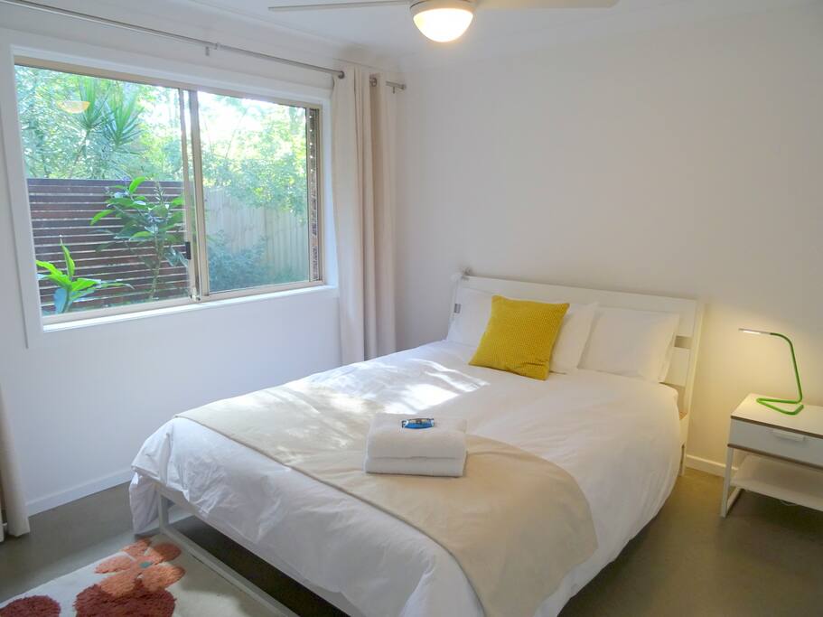 Wake up to the birdsong in Queen-sized Bedroom One.