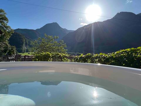 Romantic superior private Swiss chalet with hottub