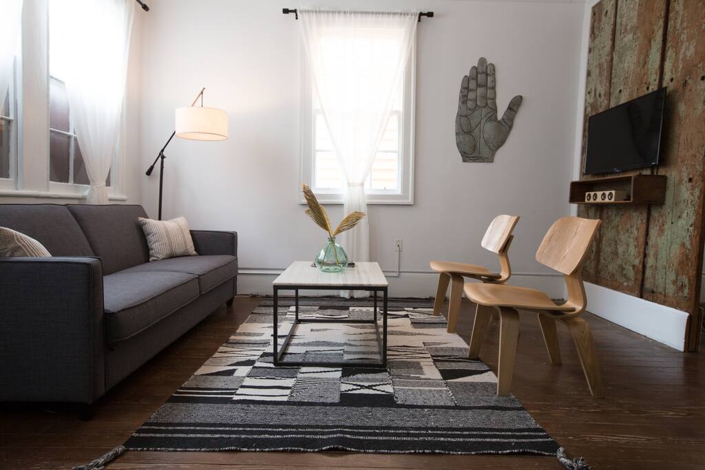 The living room with pull out sofa and tv with netflix!