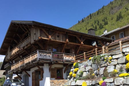 A separate bedroom with a shower and a restroom