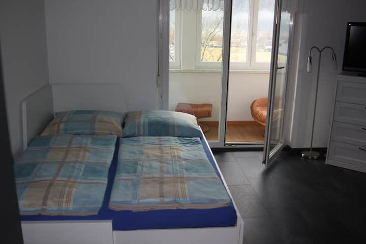 Dhoma e ndenjjes e dhomës së gjumit