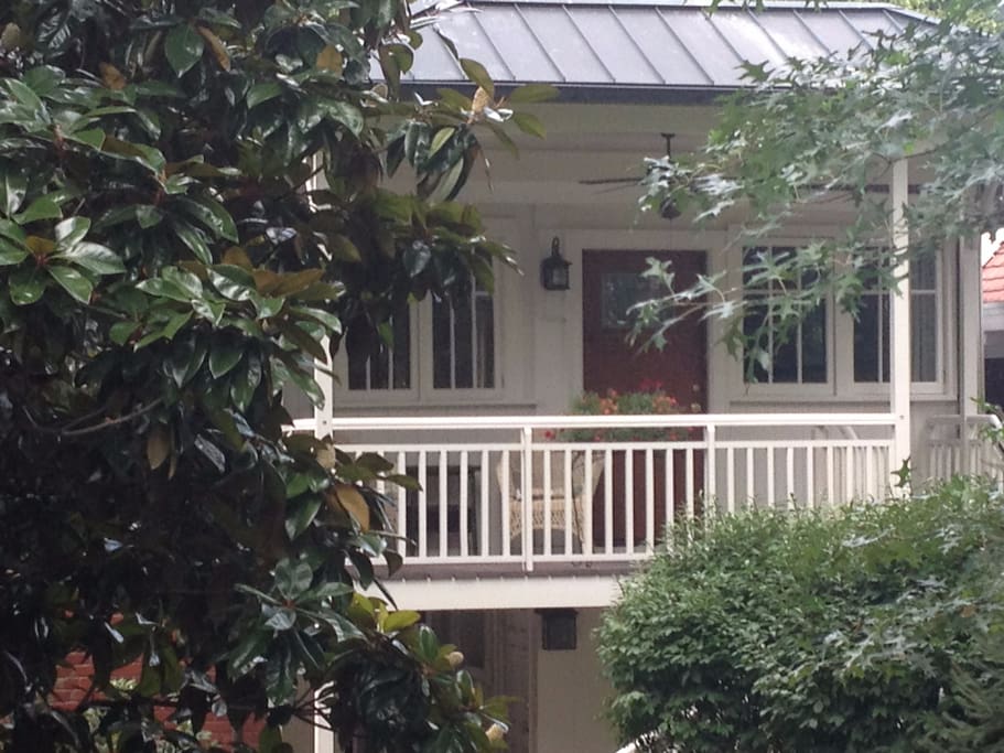 The Carriage House and porch as seen from the main house's back porch