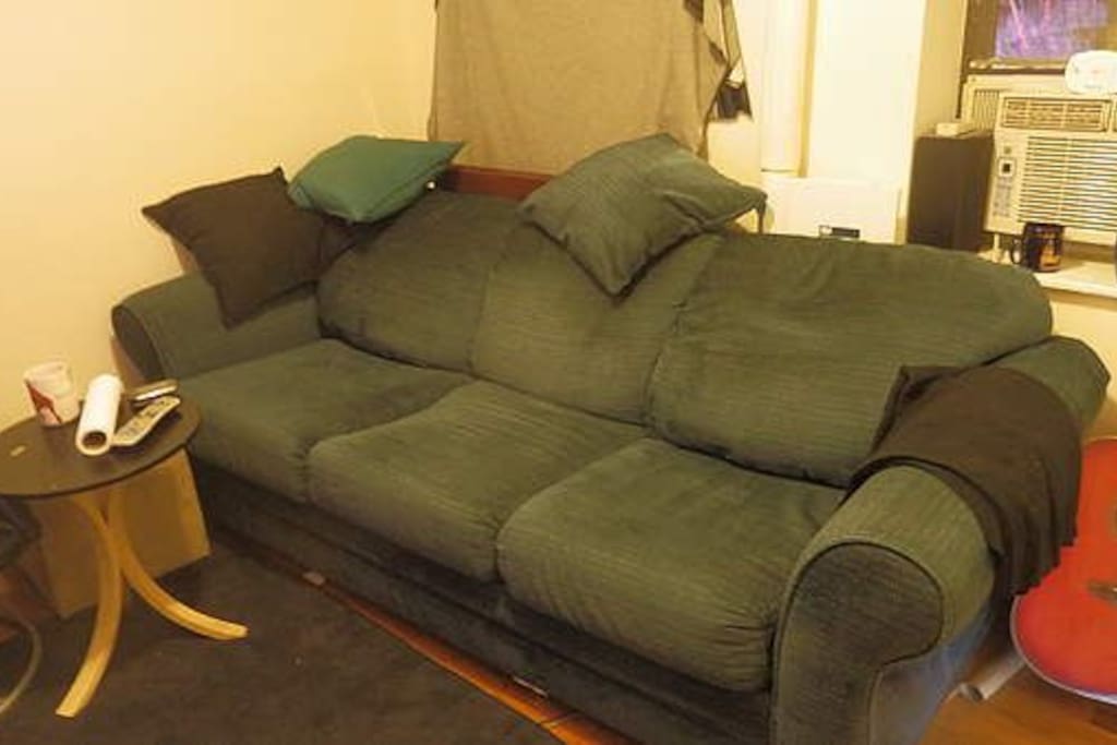 Shared living room. TV on opposite wall