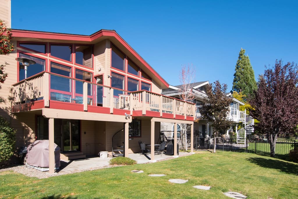 Back of house that faces canal with boat dock