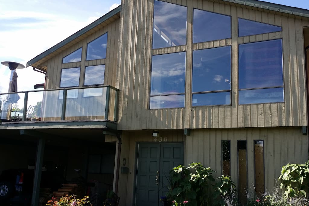 Welcome to Our Home :) The Large Windows Look Out to Vancouver by Day & Night and Fill The High Cedar Ceiling Living Room with Beautiful Natural Light. A Perfect Place To Chill. The Large Patio Overlooking the City Gives People "Deck Envy" You Get to Enjoy The Memorizing & Memorable Deck (On Left) Without Having to Pay The Crazy City Taxes!