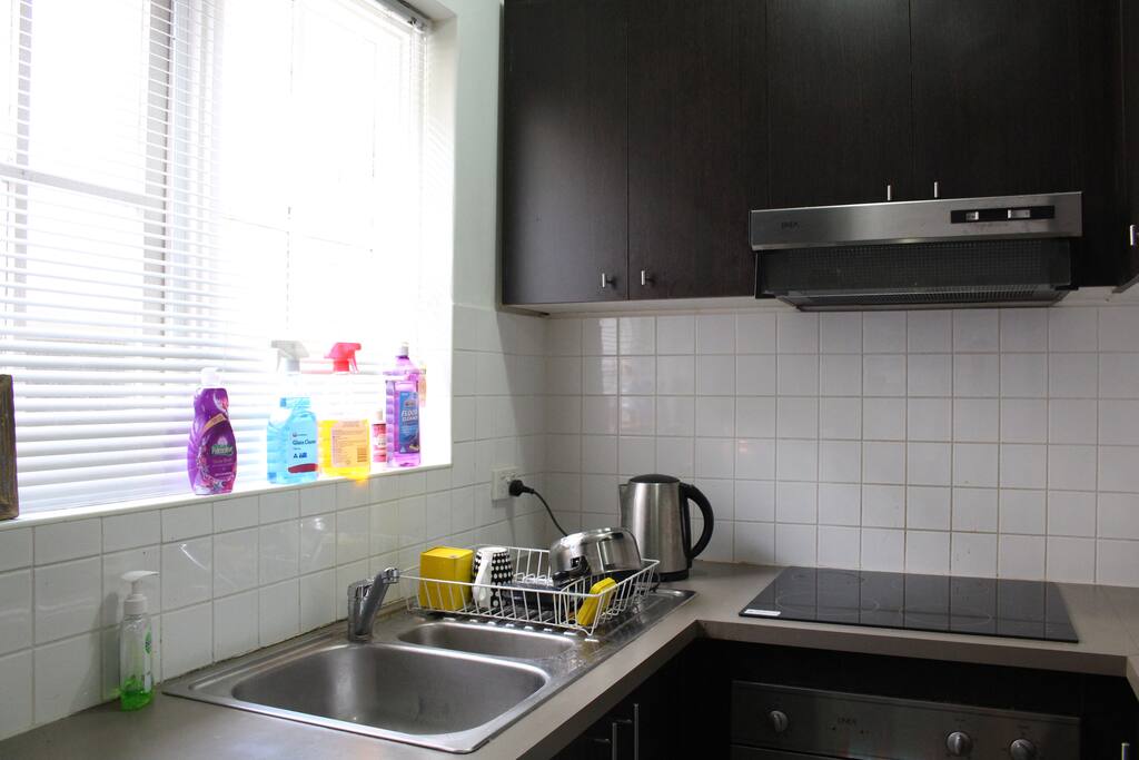 Up to date kitchen with brand new stove top