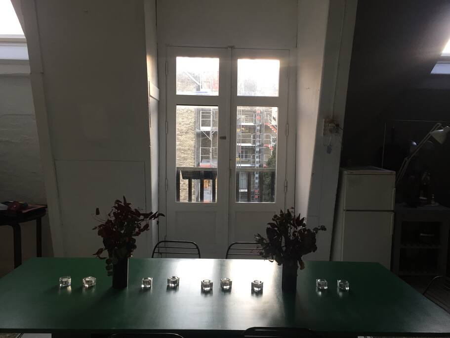 Other view from the dining table. The little French balcony. We are not smokers but if you are that is fine for you to do it here.