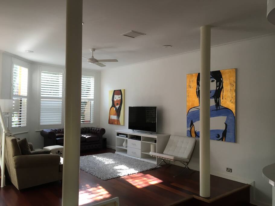 Living area with 55" led lcd TV. Bose sound system. Comfortable quality furniture.