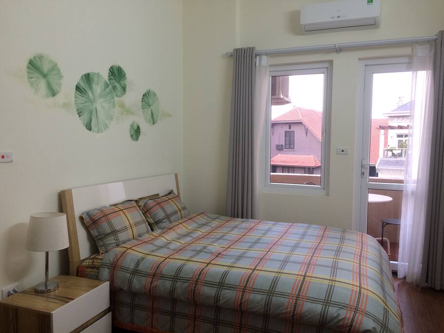 Cozy bedroom with balcony