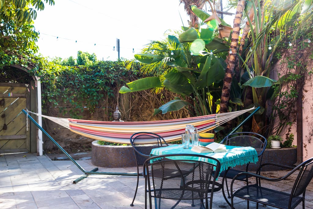 Recline in the hammock in your private backyard!