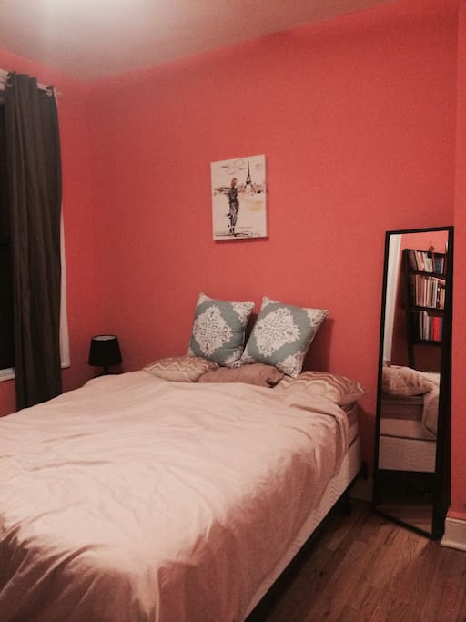 Comfortable queen sized bed in a quiet room.