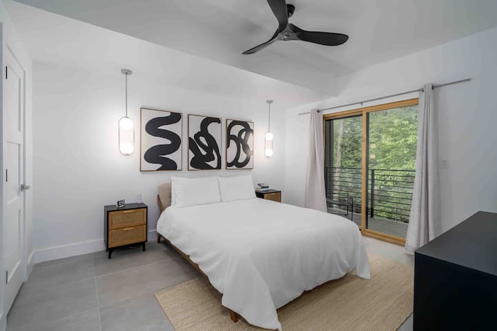 Bedroom 3 featuring private balcony and closet
