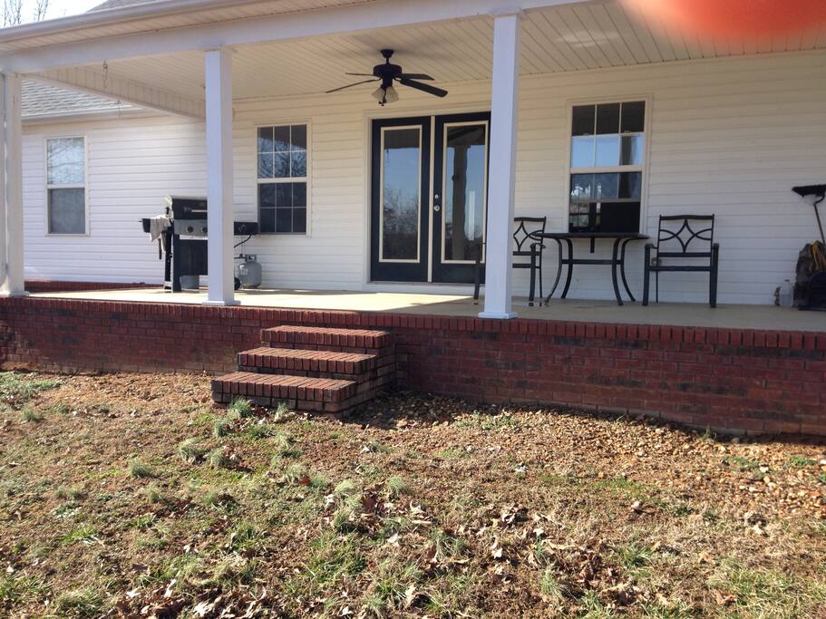 Back porch with grill and outdoor seating