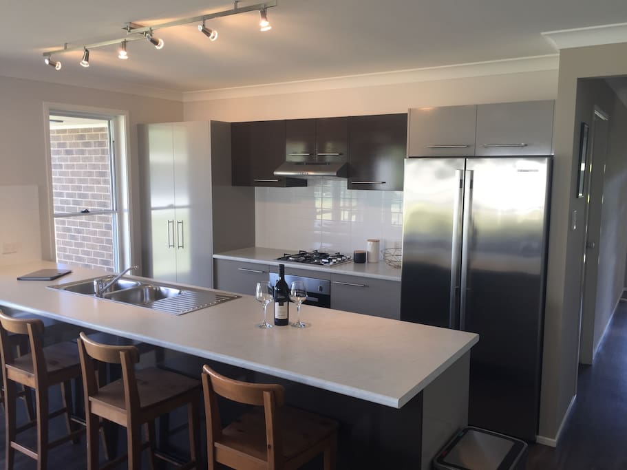 Fully equipped kitchen with huge breakfast bar