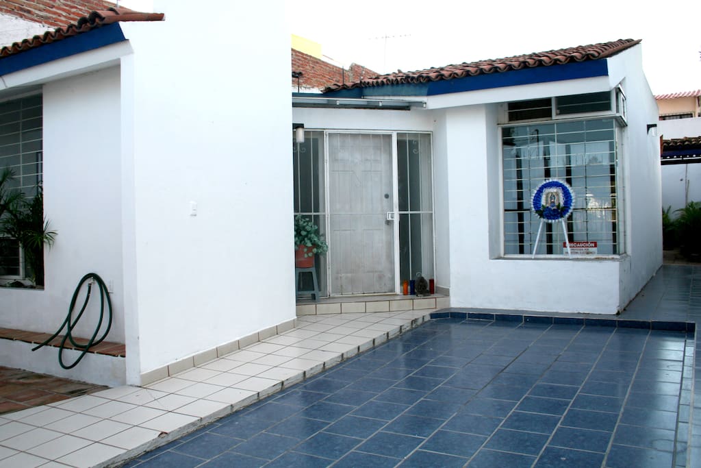 Entrance to the house. Large gate in front for security.