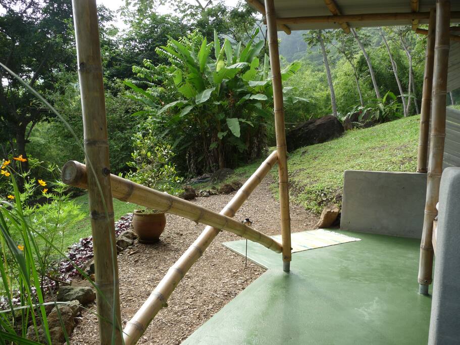 You sleep within a mosquito net, open to nature, a roof over your head, and windows that flip up, like a butterfly!