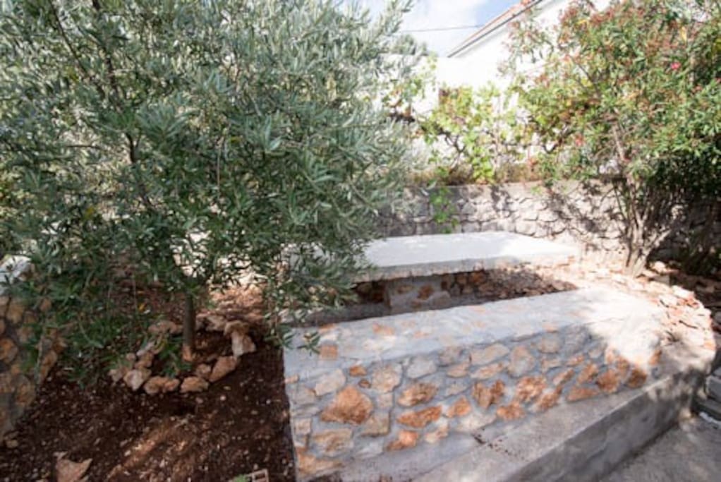 Rocky bench and table for summer feasts
