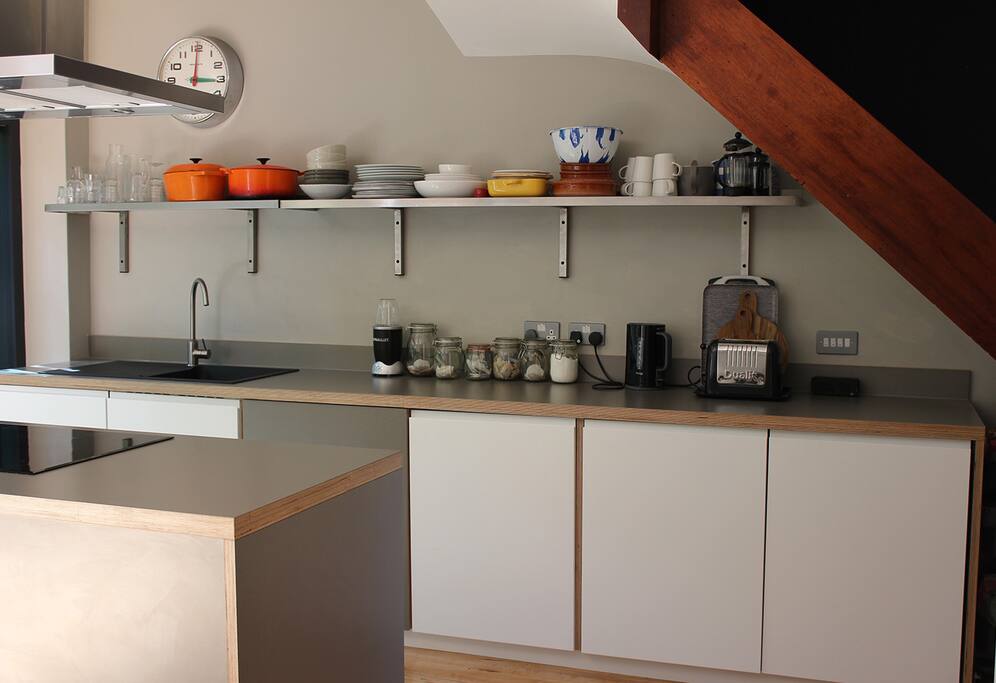 Kitchen area, Fridge, Freezer, Induction Hob, Oven, Washer Dryer.