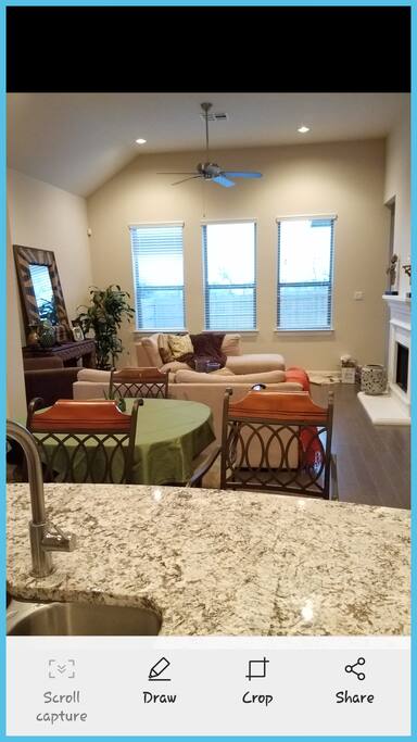 Looking from the kitchen into dining & livingroom