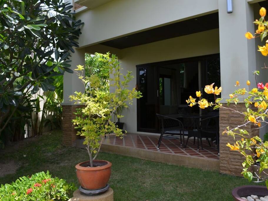 Outside terrace in the shade of a Frangipani tree