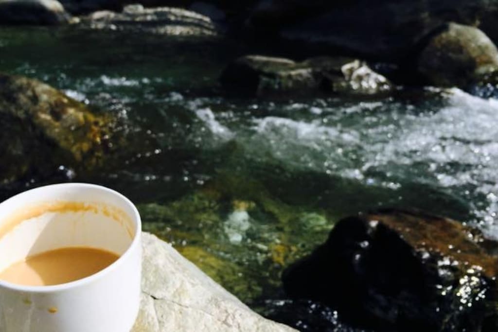 Enjoy your favorite beverage beside the river.