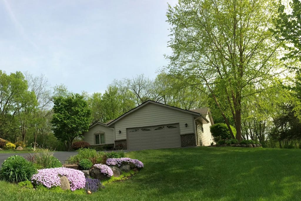 Street view, ample parking. Boulder landscaping, river birch tree, lilac tree