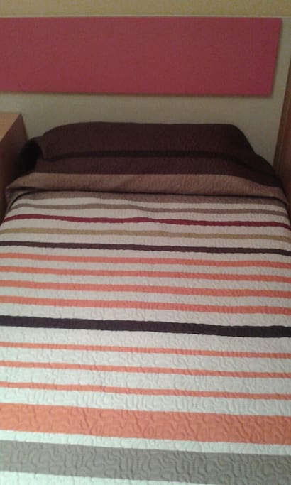 One of the two single beds.