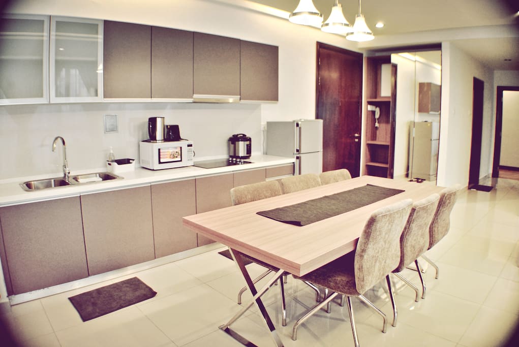 A nice & spacious dining area to indulge in a delicious meal with your loved ones.