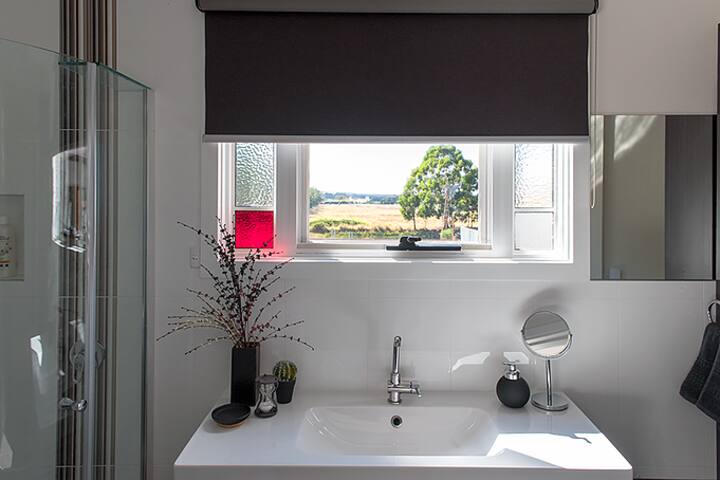 Enjoy the view (or morning sunrise if you're up early enough!) from the master bedroom ensuite.