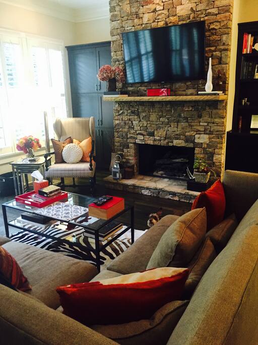 Living Room with Large Sectional and Fireplace
