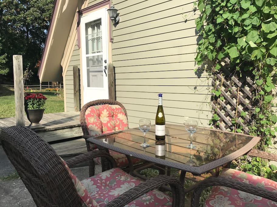 Enjoy a cup of coffee or glass of wine on the apartment patio overlooking our garden!