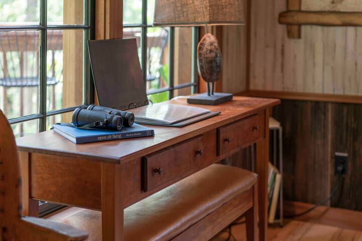 One of Jeff’s first woodworking projects, this 25-year-old Shaker desk, crafted of solid cherry, finally found its perfect home. It’s a great place for working or writing while enjoying the woods right outside the window.
Credit: Dickersonarts.com
