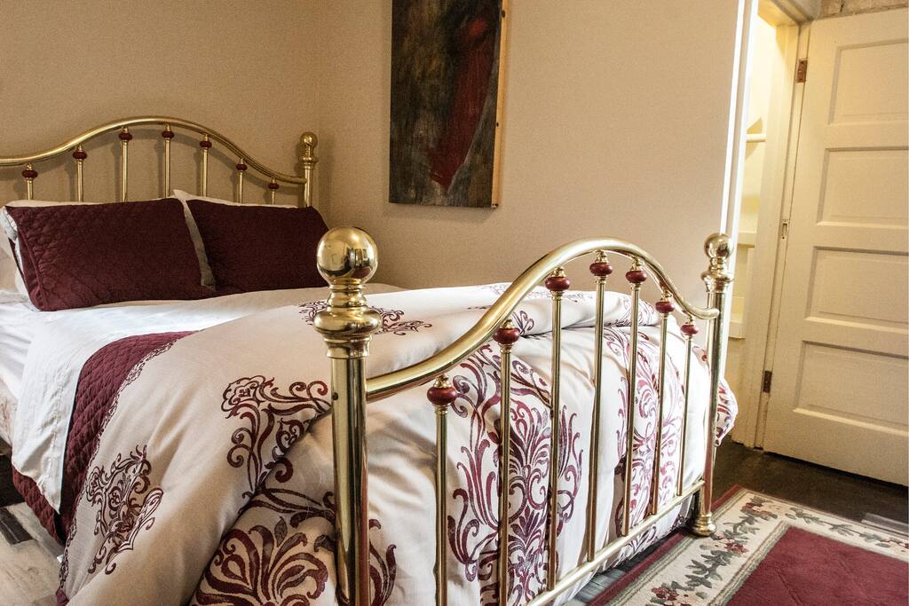03A Luxurious Queen Size Brass Bed in your room, along with a full closet.