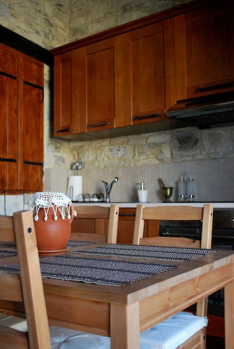 A view of the kitchen and dining area, which have a unique view of the courtyard.