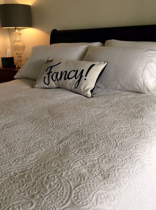 There's a down-filled duvet is under that bedspread.