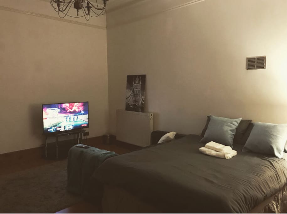 Large flat screen TV with access to Netflix