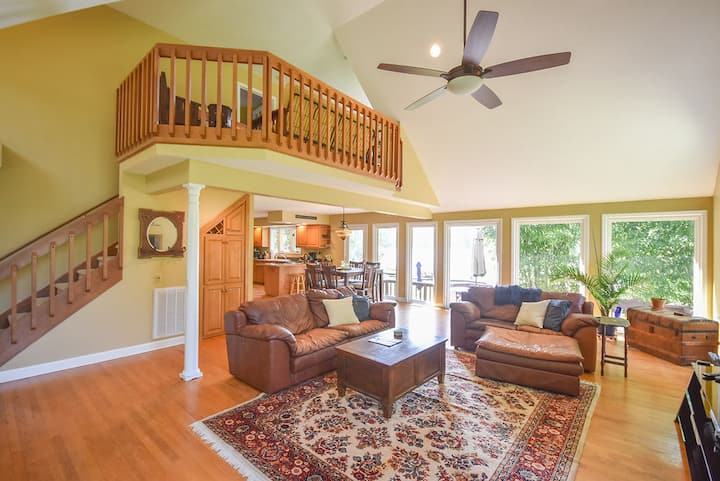 Kick back on the comfy couches in the great room, which overlooks the back deck and the lake.