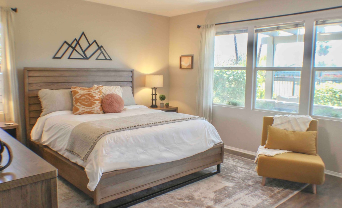 Spacious primary bedroom retreat. Adjustable (head only)  California King with luxurious linens.