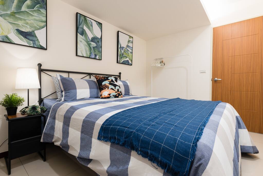 This kingsize bed in the bedroom has great space for two. The apartment has 3 kingsize beds and a big sofa bed!