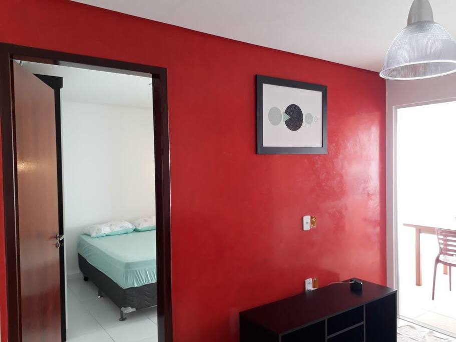VISTA SALA COM TV E QUARTO