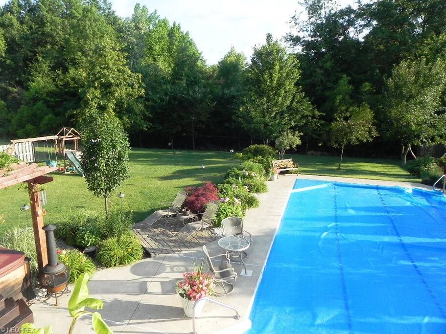Large deck area with wooded surrounding