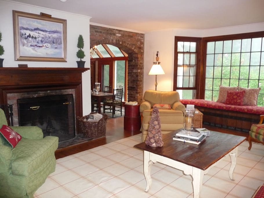 Living area with fireplace and game table