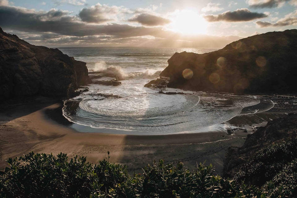 A black-timber house above Piha Beach, Piha, Auckland, New Zealand, photo 10 of 10