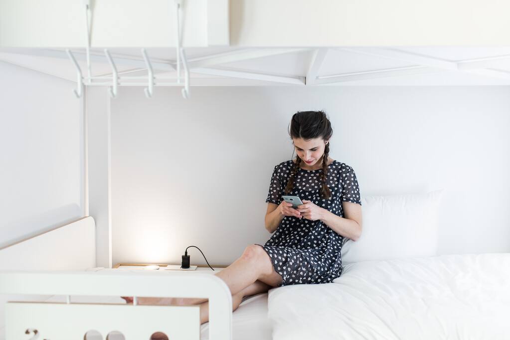 Each bed has an outlet and light